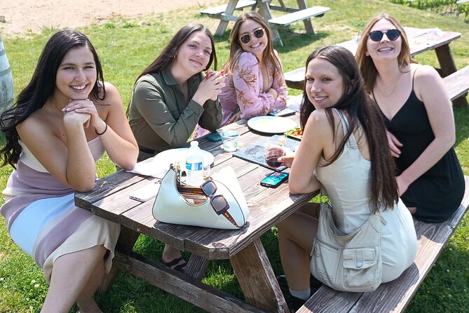 NON BUS Traverse City Old Mission Sunset Wine & Distillery Tour - Logistics: Meeting Point, Duration, and Group Size