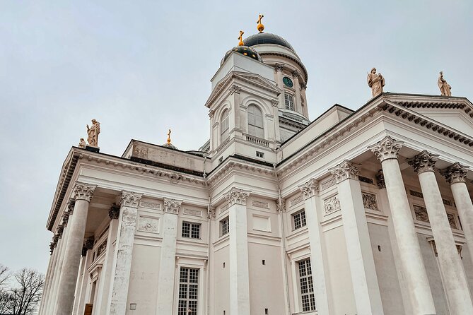 Nordic Noir Portraits - Cinematic Photoshoot in Helsinki - Walking Through Authentic Helsinki Neighborhoods at Aleksis Kiven patsas