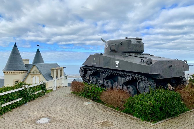 Normandy Battlefields D-Day Private Trip with VIP Services from Paris - Exploring Arromanches and the Mulberry Harbour Remnants