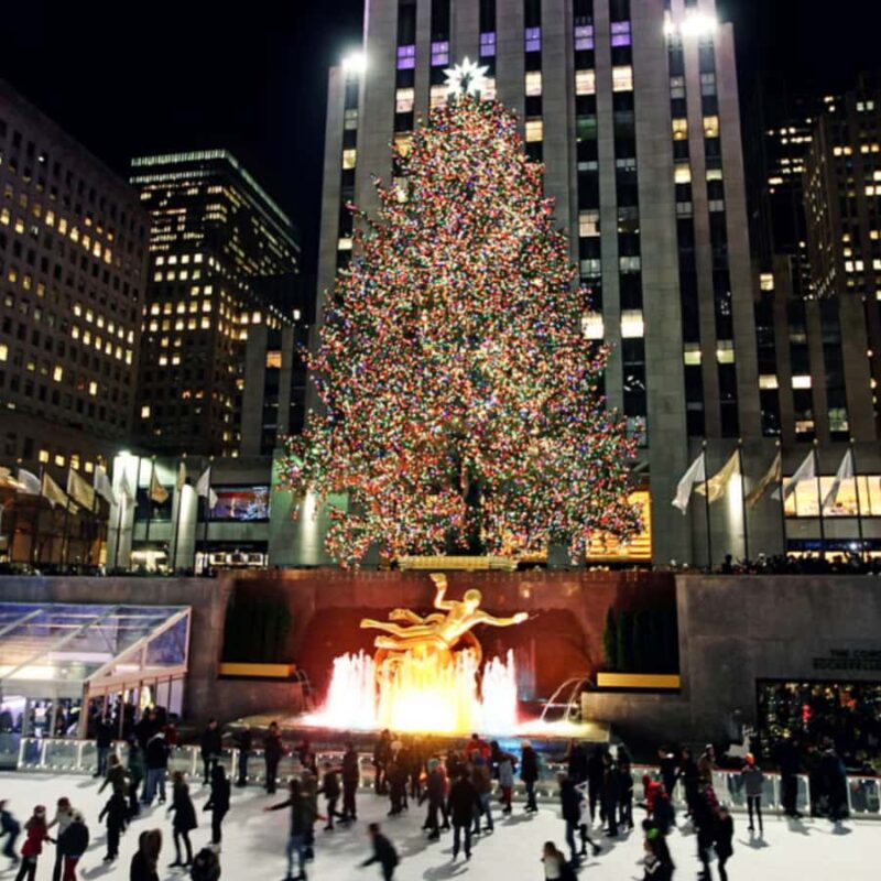 NYC Festive Magic: Christmas Lights Experience - The Ultimate Christmas Symbol: Rockefeller Center Tree and Rink