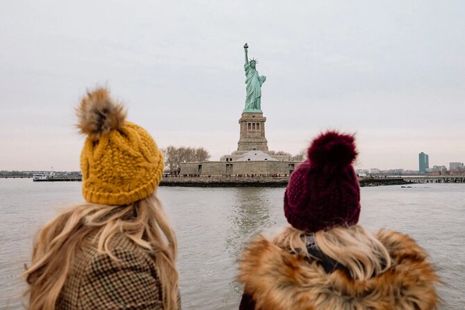 NYC Night Bus Sightseeing Tour with Free Statue of Liberty Cruise - The Significance of the Statue of Liberty and Ellis Island Experience