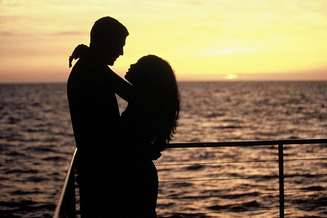 Oahu: Snorkel Sunset Cruise, Dolphin Watch with Hawaiian Buffet - Dolphin Watching with a 91% Chance of Encounter