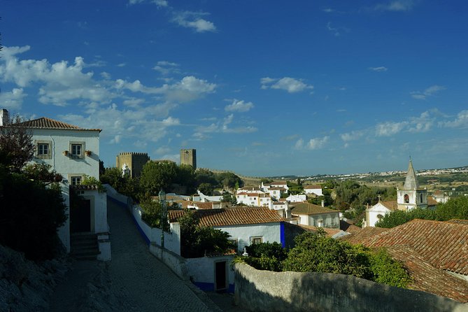 Óbidos: Medieval Tales & Secrets Spots - Sampling Ginjinha in a Local Home