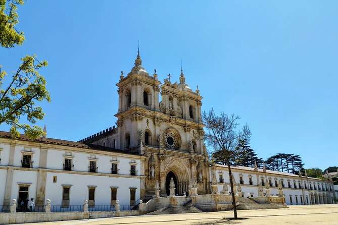 Óbidos Nazaré Alcobaça Batalha and Fátima Tour - Explore Portugal’s Iconic Heritage and Scenic Beauty in a Single Day