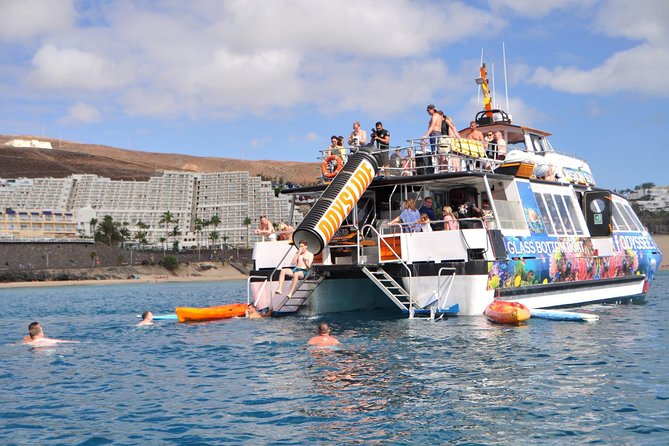 Odyssee 3: The Glass Bottom Boat Tour in Fuerteventura - Beach Stop with Canarian Lunch and Cocktails