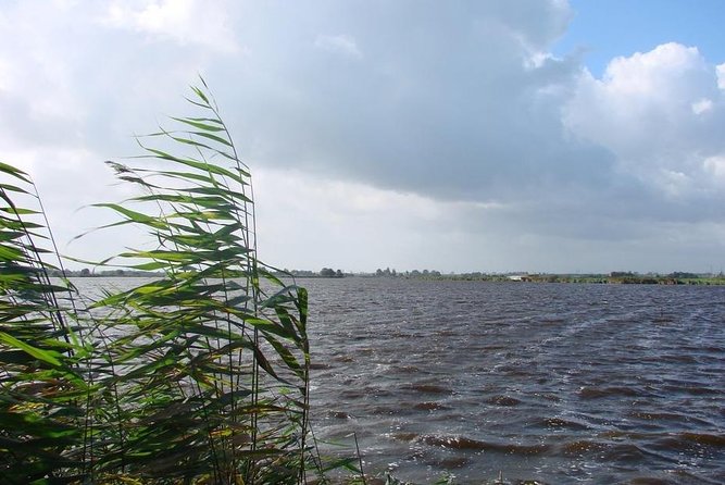 Off the beaten paths Dutch Country Side Private Tour in Jaguar - Scenic Stop at Durgerdam and Zuiderwoude