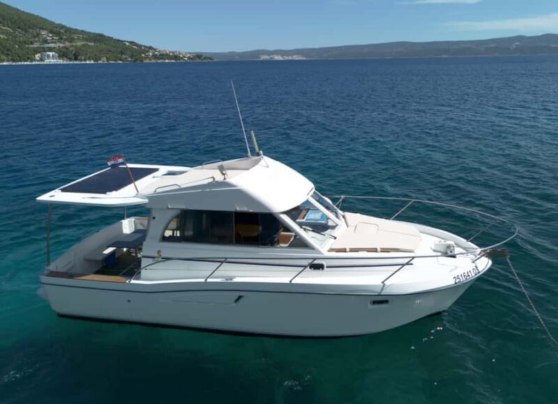 Omi: Bra Island Private Boat Tour with Lunch & Drinks - Water Activities: Snorkeling, Paddleboarding, and Swimming