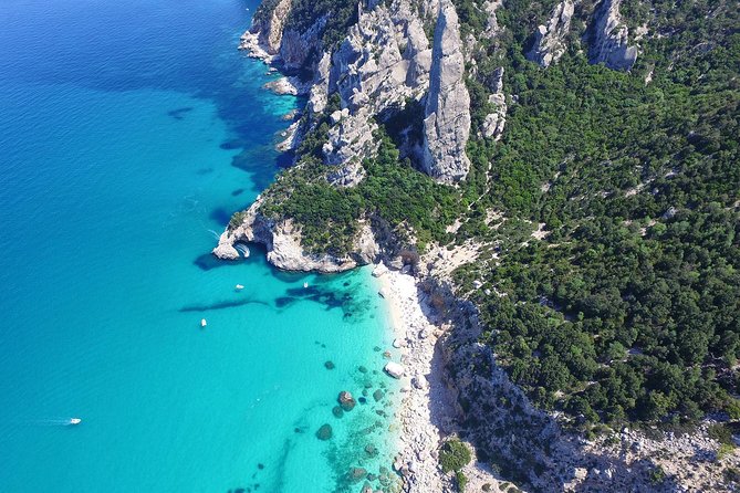 One day guided boat tour along the Baunei coast. - Experience Sardinia’s Spectacular Baunei Coast by Boat for $68.61