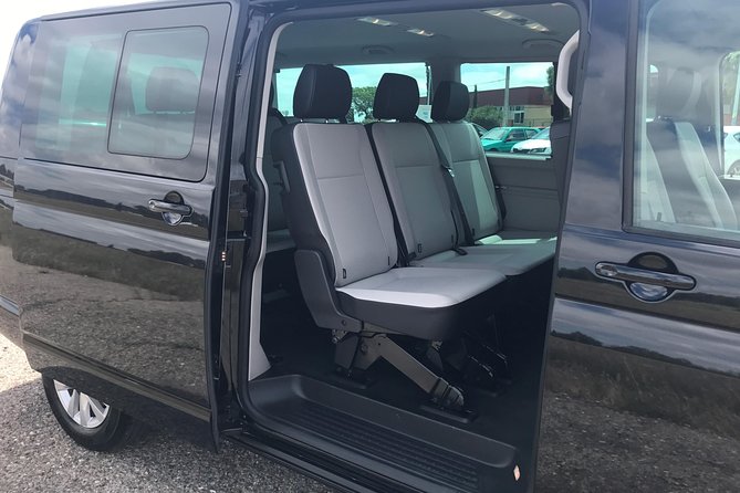 One-way transfer by minivan from Seville Airport to hotel in Seville Center - Key Points