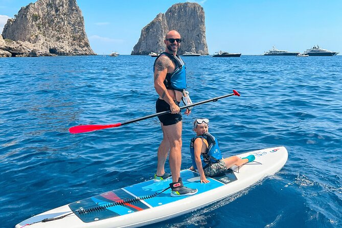 Paddleboard in Capri between caves and beaches - Iconic Views of the Faraglioni Rocks