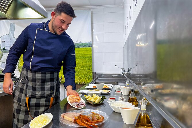 Paella Cooking Class, Wine Tasting & Central Market in Valencia - Starting Point at MYR Hotel Palau Vallier in Valencia