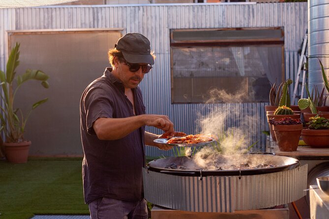 Paella Master Class in a Charming Rooftop Kitchen - Learning About Paella’s History and Techniques