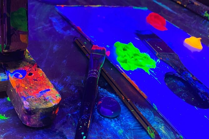 Paint a neon fluorescent picture while drinking unlimited wine - Unlimited Wine and Water for a Relaxed Vibe
