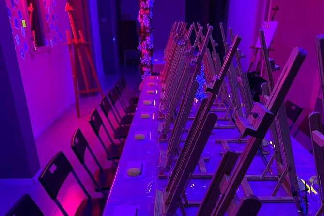 Paint a neon fluorescent picture while drinking unlimited wine - The Artistic Results and Keepsakes