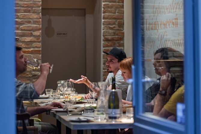 Palace District Evening Culinary, Wine, and History Walk - Key Points