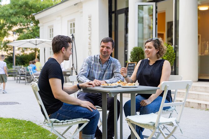 Palace District Evening Culinary, Wine, and History Walk - Sampling Snacks at a Historic Bakery