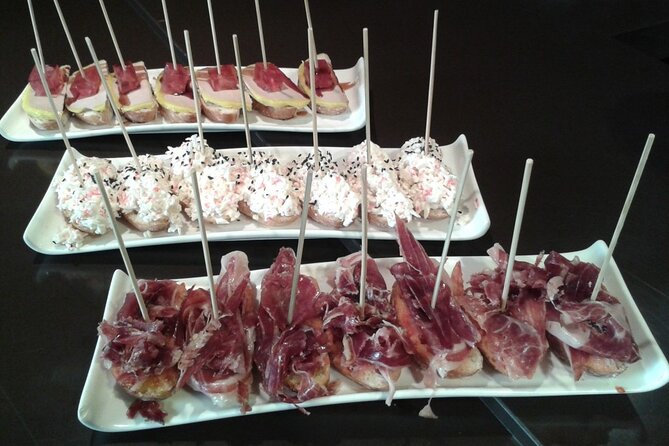 Palamos Shore Excursion: Girona History and Gastronomy Private Tour - Visiting Local Taverns and Sampling Catalan Products