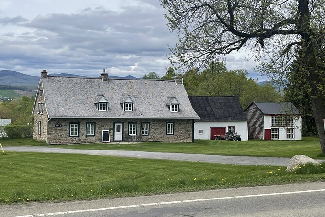 Panoramic and historical tour of the Île d'Orléans - Walking Through Maison De Nos Aieux and the Ancestry Park