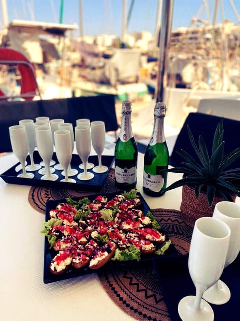 Panormo: Private Sunset Sailing Cruise with Drinks & Snacks - Local Snacks, Drinks, and the Onboard Atmosphere
