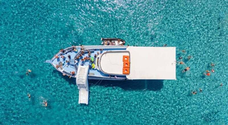 Paphos Blue Lagoon Cruise: Slide, Music & Hotel Transfer - Key Points