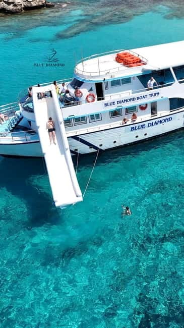 Paphos Blue Lagoon Cruise: Slide, Music & Hotel Transfer - From Paphos to Latchi Harbour: Convenient Transfers and Scenic Drive