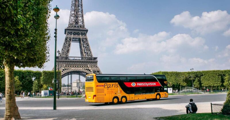 Paris: Audio-Guided Bus Tour & Seine River Cruise - From the Bus: Panoramic Sightseeing and Interactive Features