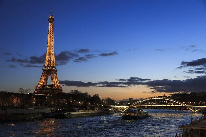 Paris By Night with Seine River Cruise and Roundtrip Luxury Transportation - Key Points
