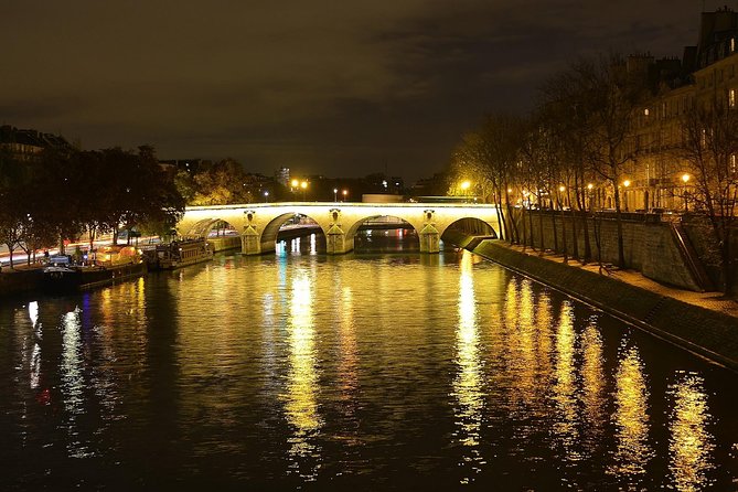 Paris By Night with Seine River Cruise and Roundtrip Luxury Transportation - Iconic Bridges and Architectural Highlights