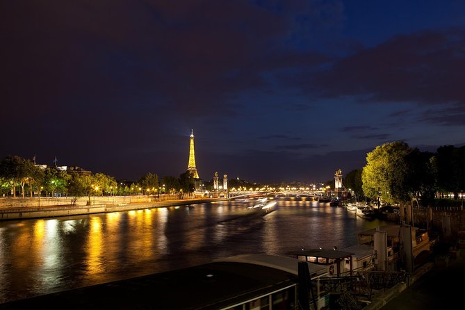 Paris By Night with Seine River Cruise and Roundtrip Luxury Transportation - The Guides Role and Commentary