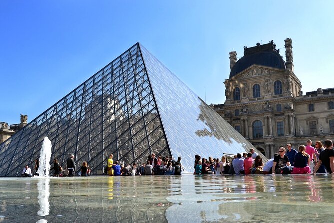 Paris by Rail with Sightseeing Bus and River Seine Lunch Cruise - The Iconic Eiffel Tower Photo Stop