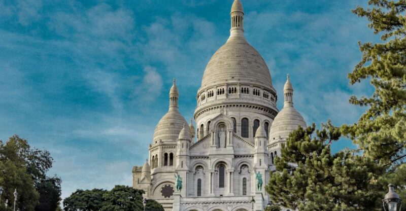 Paris: Charms of Montmartre Guided Walking Tour - Montmartre’s Legendary Sights and Stories