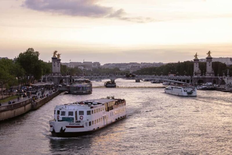 Paris: City of Lights Walking Tour and Seine River Cruise - Crossing the Gilded Pont Alexandre III