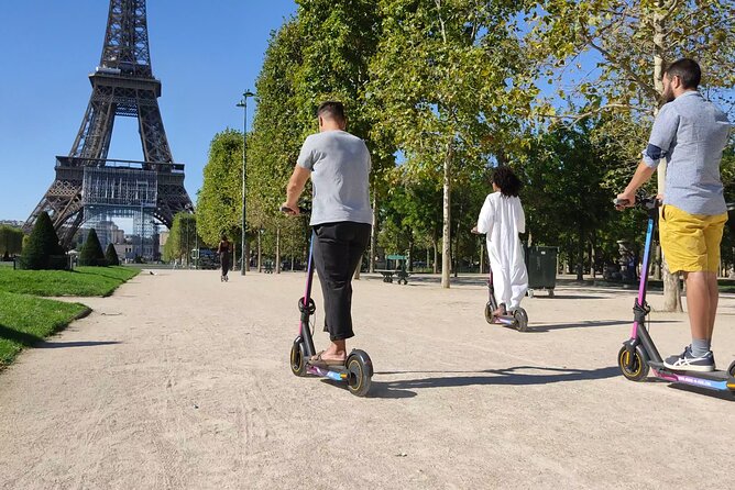 Paris City Tour by E-Scooter with Fun Guide (Small groups) - Unlocking the Secrets of the Louvre Museum