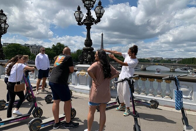 Paris City Tour by E-Scooter with Fun Guide (Small groups) - Visiting the Arc de Triomphe