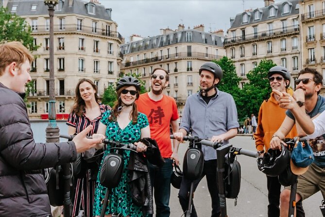Paris E-Scooter Tour with fun & informative guide (small groups) - Scenic Views Along the Seine River