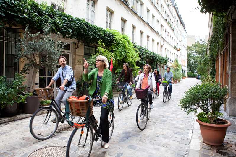 Paris: Ile de la Cité and Marais Guided Food Tour by Bike - From Historic Market to Elegant Palais-Royal