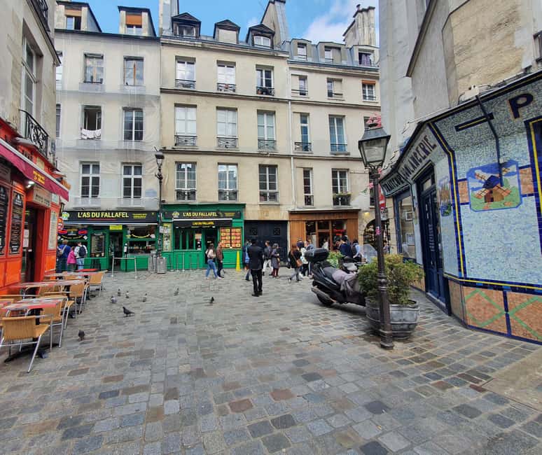 Paris: Jewish Heritage & Hidden Gems of Le Marais - Walking Through the Iconic Place des Vosges
