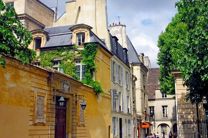 Paris La Marais District Guided Walking Tour - Marvel at Architectural and Religious Landmarks