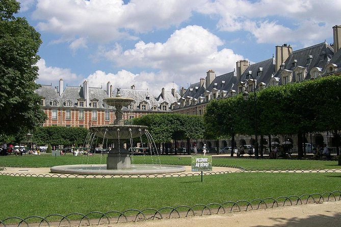 Paris Le Marais Historical Walking Tour with Wine and Cheese Tasting - Riverside Stroll and Landmark Views