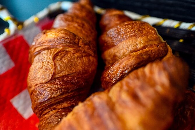 Paris Le Marais Walking Food Tour with Secret Food Tours - Sampling French Breads at a Traditional Bakery