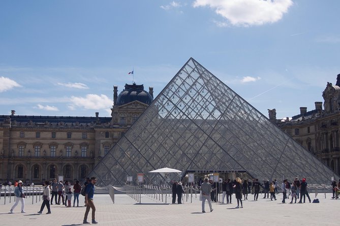 Paris Louvre Museum Skip the Line Must-Sees Guided Tour - Exploring the Louvre’s Historic Origins and Architecture