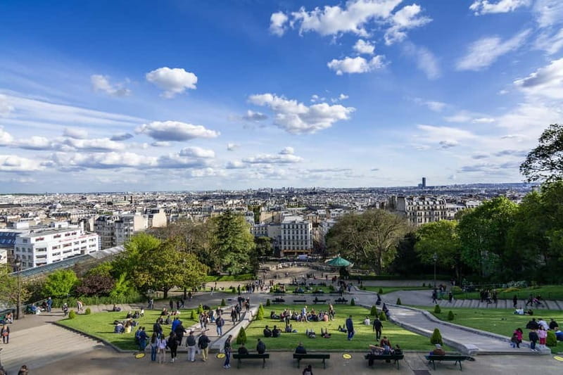 Paris: Montmartre Highlights Walking Tour with a Local Guide - Starting at Place Saint-Pierre with Stunning Views Over Paris