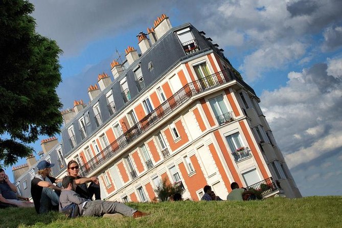 Paris: Montmartre & Sacré Coeur Private Walking Tour - Visiting the Historic Eglise Saint-Pierre de Montmartre