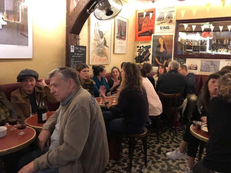 Paris: Saint-Germain-des-Prés Guided Tour with Wine & Cheese - Visiting the Famous Cafes: Les Deux Magots and Café de Flore