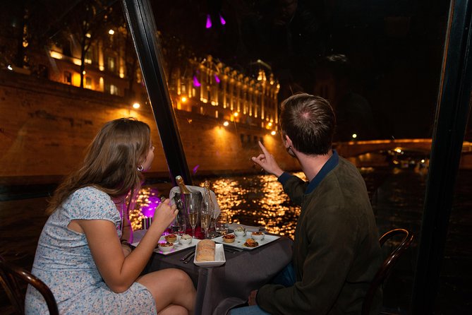 Paris Seine River Dinner Cruise with Champagne and Window Seating - Dining Experience and Menu Highlights