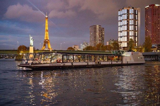 Paris Seine River Dinner Cruise with Champagne and Window Seating - Seating and Atmosphere