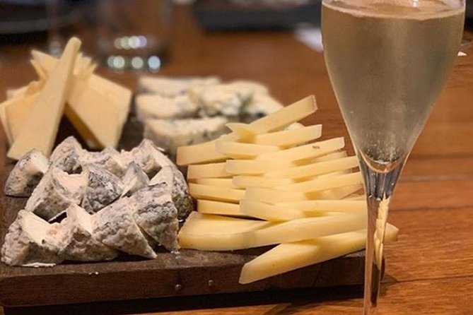 Paris Wine Tasting plus Cheese Lunch with an Expert Sommelier - Discover the Central Paris Wine Bar in a Converted Cellar