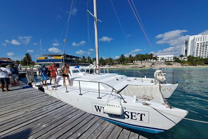 Party at Sea Private Catamaran Tour with Music and Drinks - The Beach Club Experience and Buffet Dining