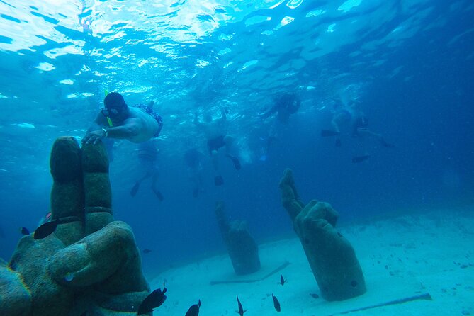 Party at Sea Private Catamaran Tour with Music and Drinks - Snorkeling Equipment and Guide Services