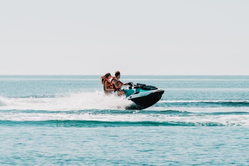 Peguera: Racing Car Drive and Jet Ski Combo Tour - Cost, Cancellation, and Booking Flexibility